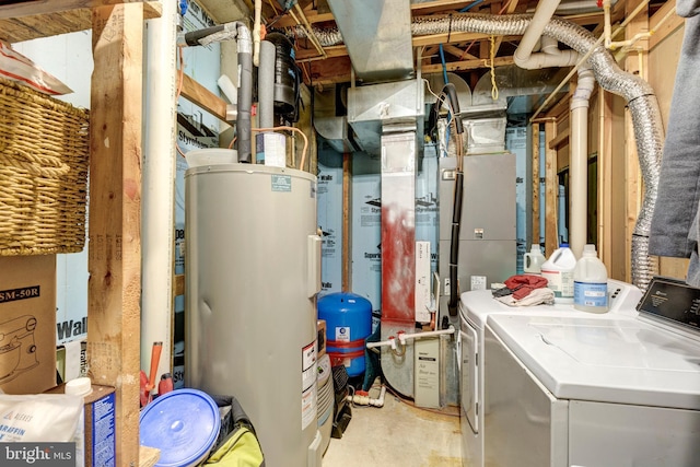 utility room featuring separate washer and dryer and electric water heater