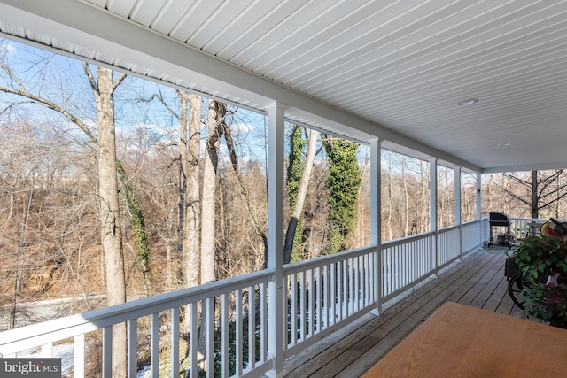 wooden terrace with grilling area