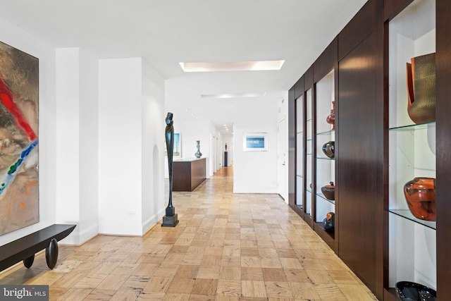 hall with light parquet floors