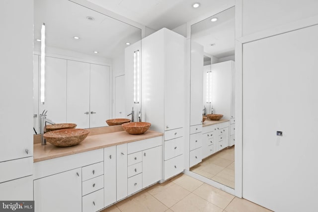 bathroom featuring vanity and tile patterned floors