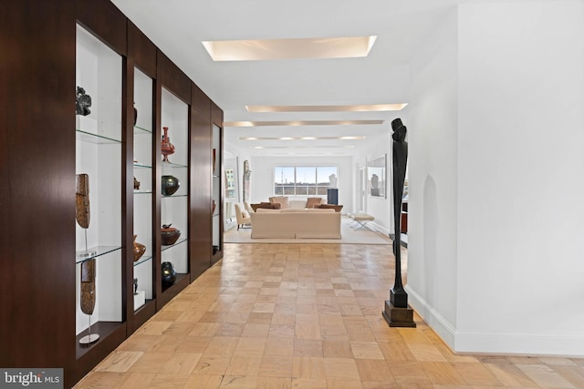 hallway featuring light parquet floors