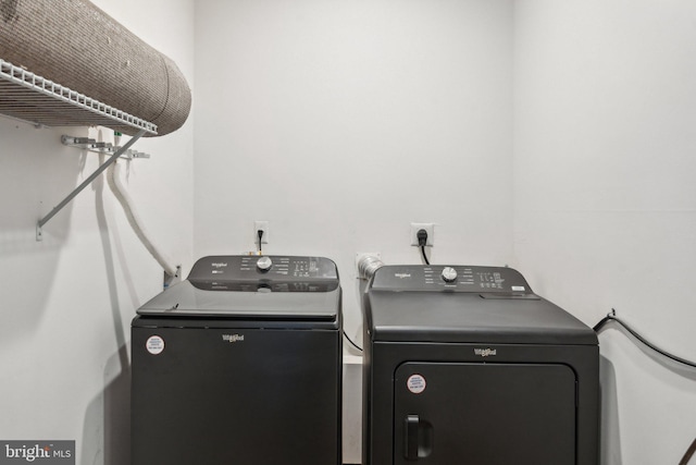 washroom featuring independent washer and dryer