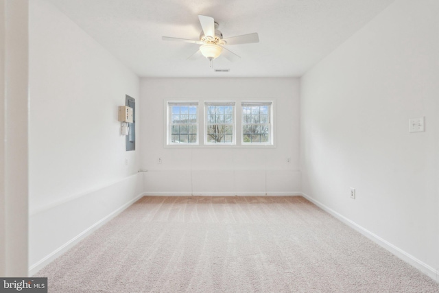 unfurnished room with carpet floors and ceiling fan