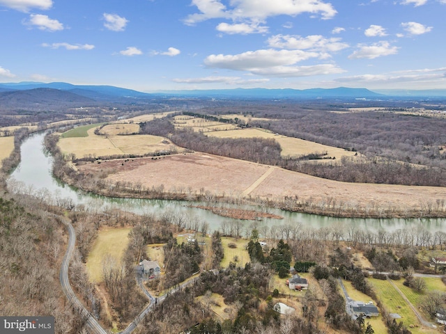 aerial view with a rural view and a water and mountain view