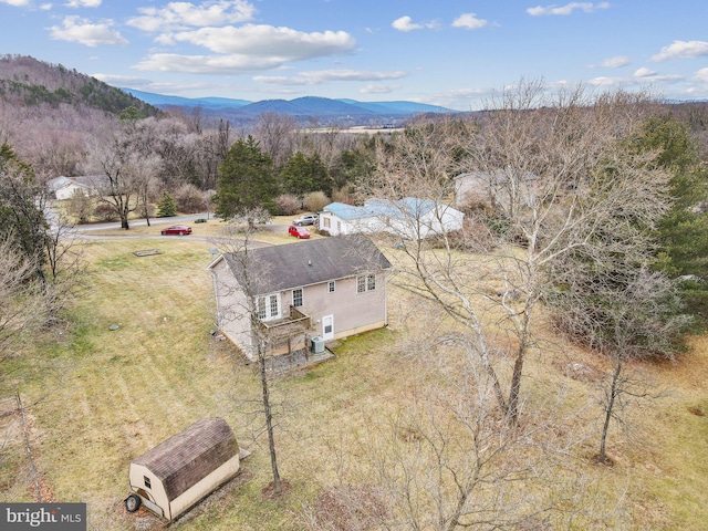 drone / aerial view featuring a mountain view