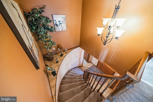 stairway featuring tile patterned floors