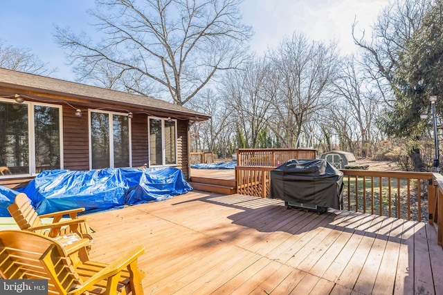 deck featuring grilling area