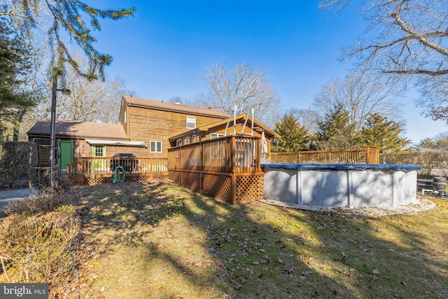 view of yard featuring a swimming pool side deck