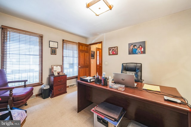 office area with light carpet