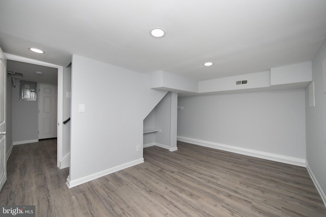 interior space with dark hardwood / wood-style flooring