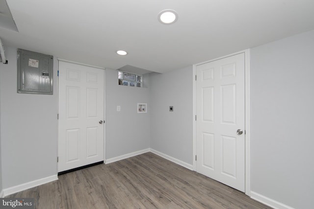 laundry room with washer hookup, hardwood / wood-style floors, electric panel, and hookup for an electric dryer