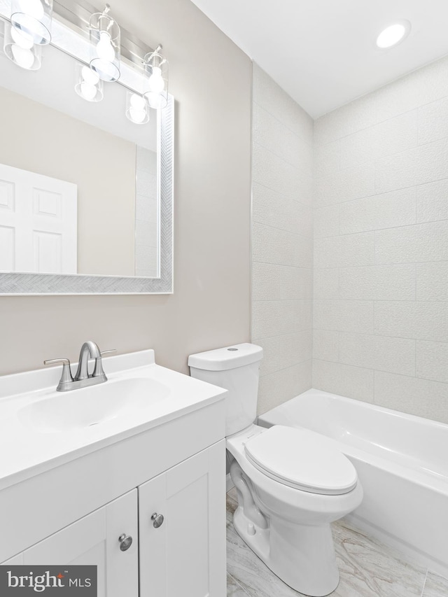 full bathroom with vanity, toilet, and shower / washtub combination