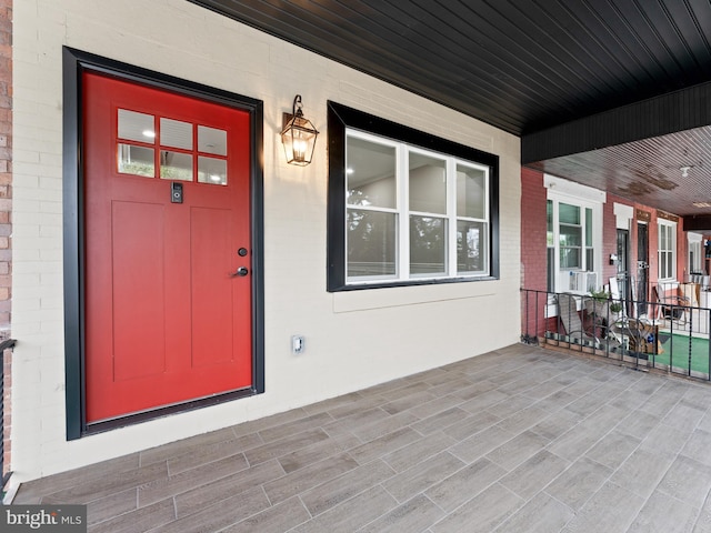 entrance to property with covered porch