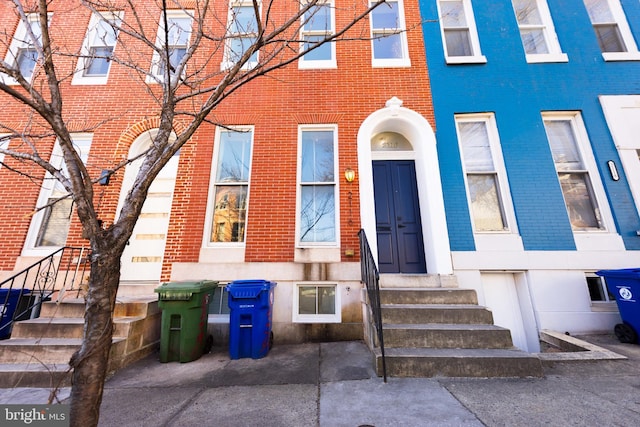 view of front of home with brick siding