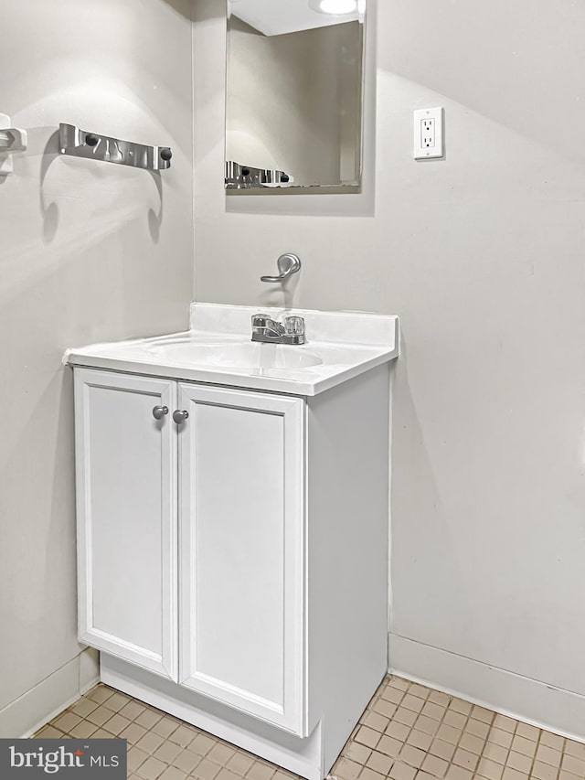 bathroom with vanity and tile patterned floors