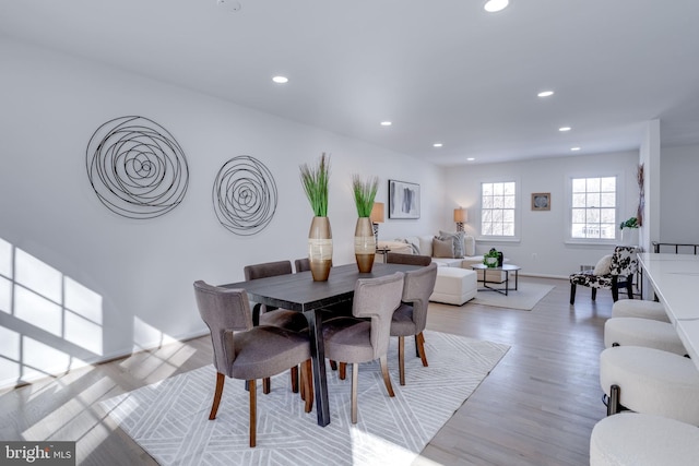 dining room with light wood-type flooring