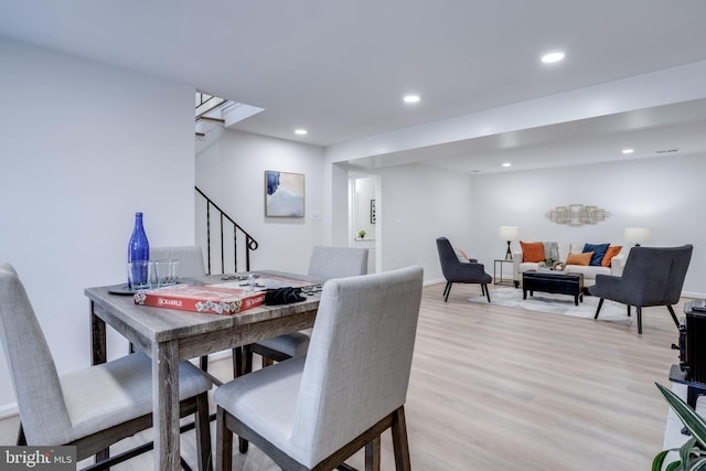 dining room with light wood-type flooring