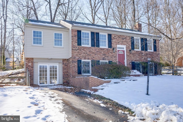 bi-level home featuring a garage