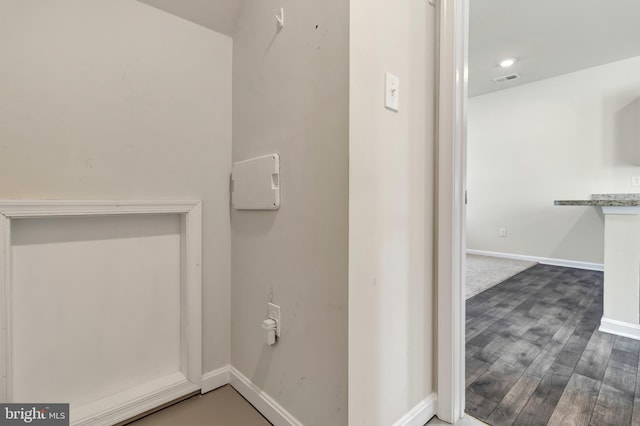 bathroom with hardwood / wood-style flooring