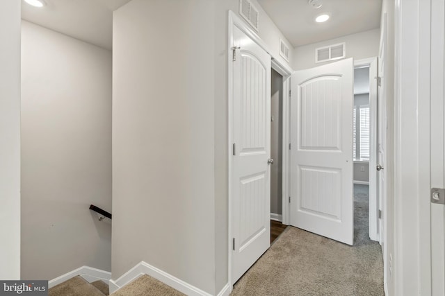 hallway featuring carpet