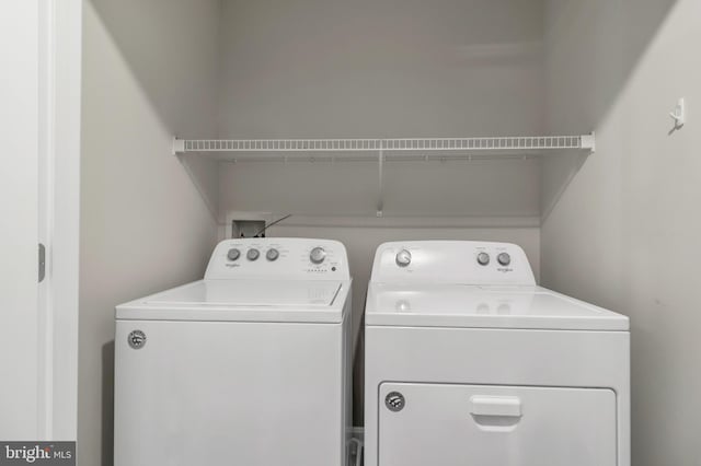 laundry room featuring washer and dryer