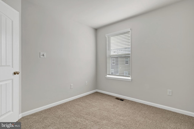 view of carpeted spare room