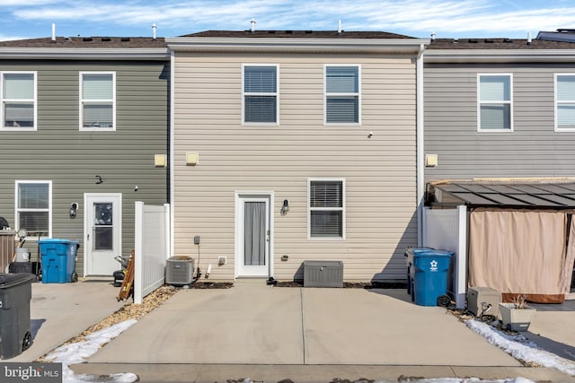 back of house with a patio