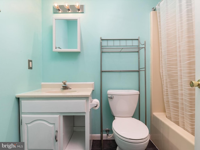 full bathroom featuring vanity, tile patterned floors, toilet, and shower / bathtub combination with curtain