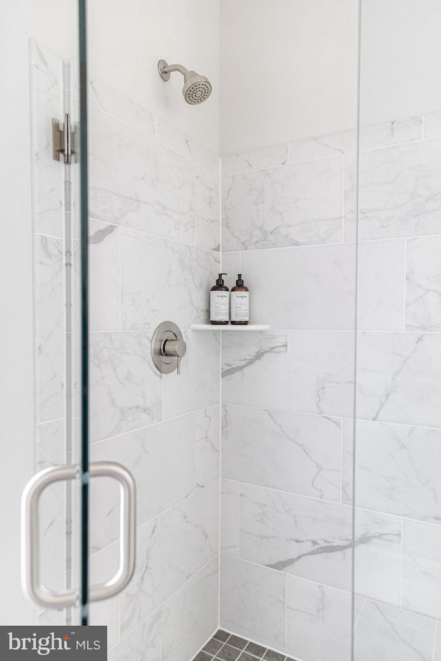 bathroom with an enclosed shower