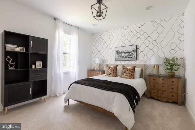 bedroom with light colored carpet