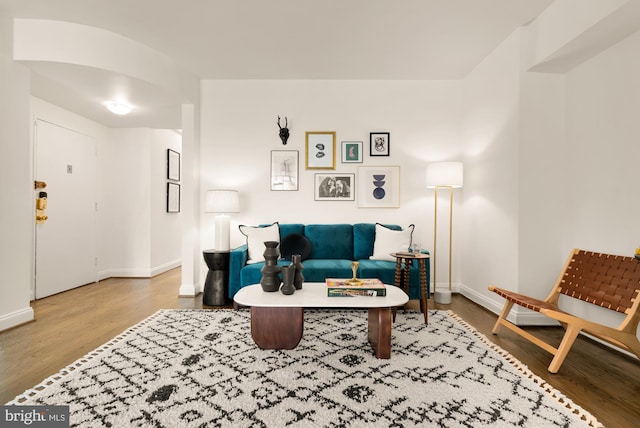 1727 Massachusetts Ave NW Unit 307, Washington, DC 20036 - living area featuring wood finished floors and baseboards
