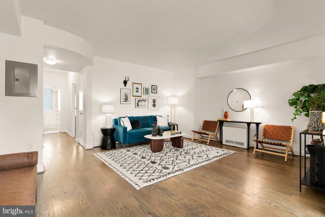 1727 Massachusetts Ave NW Unit 307, Washington, DC 20036 - living room with baseboards, dark wood-style floors, and electric panel