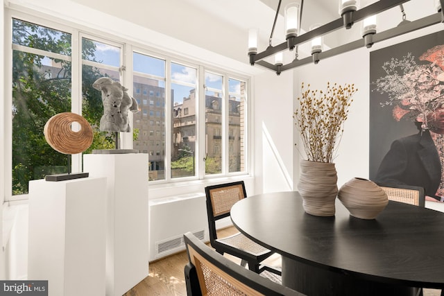 1727 Massachusetts Ave NW Unit 307, Washington, DC 20036 - dining room featuring visible vents and wood finished floors