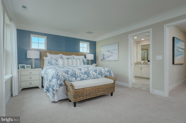 carpeted bedroom featuring crown molding, connected bathroom, and multiple windows