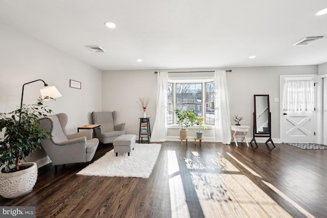 living area featuring dark hardwood / wood-style floors