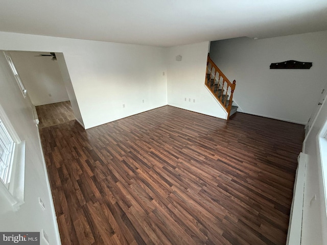 empty room featuring dark hardwood / wood-style flooring