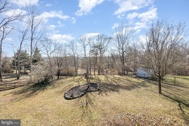 view of yard with a rural view