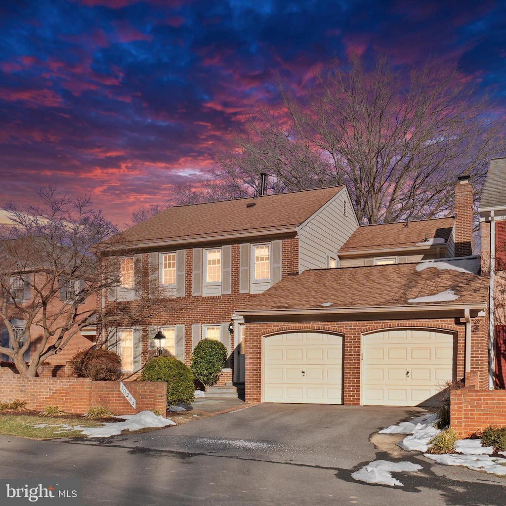 view of front of home with a garage