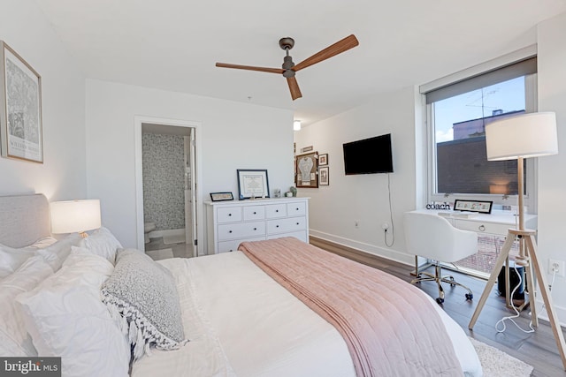 bedroom featuring ceiling fan, ensuite bathroom, and light wood-type flooring