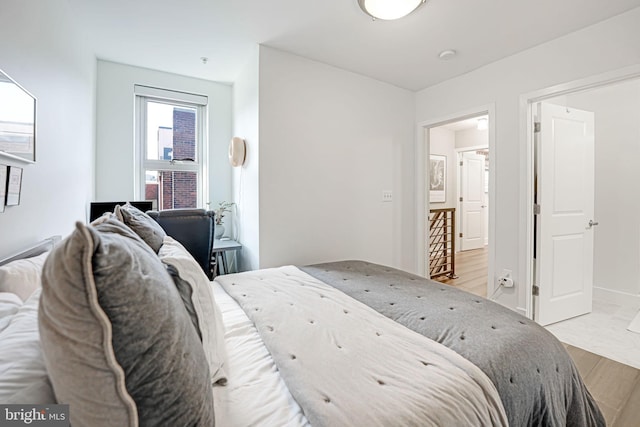 bedroom featuring light wood-type flooring