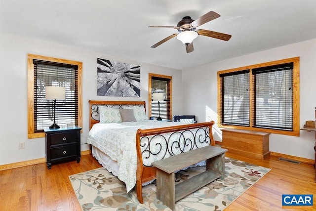 bedroom featuring wood-type flooring and ceiling fan