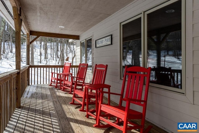 view of snow covered deck