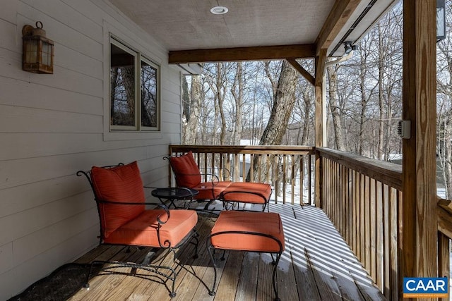 view of snow covered deck