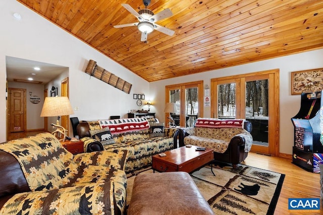 living room featuring lofted ceiling, ceiling fan, wood ceiling, light hardwood / wood-style floors, and french doors