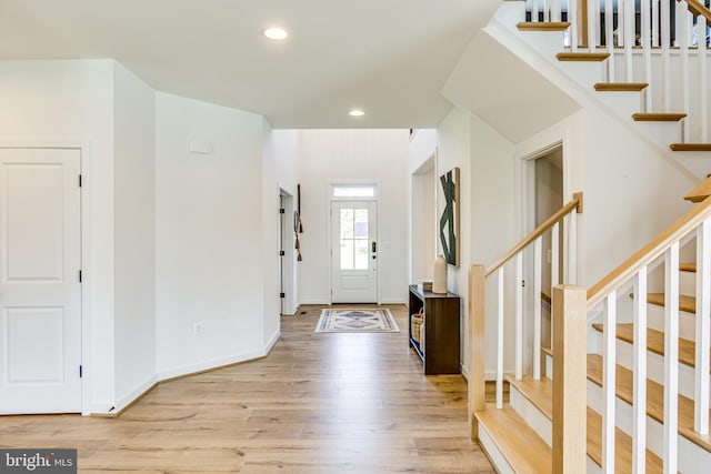 foyer with light wood-type flooring