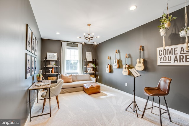 sitting room with an inviting chandelier and carpet flooring