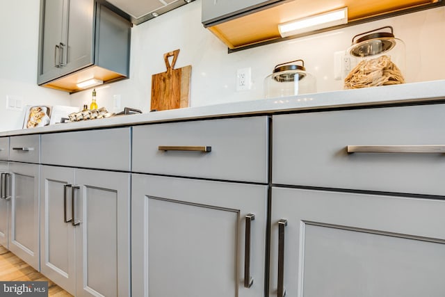 bathroom with hardwood / wood-style flooring