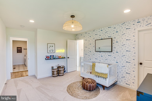 sitting room with carpet flooring and washer and clothes dryer