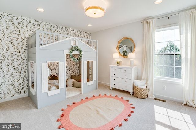 playroom with french doors and light carpet