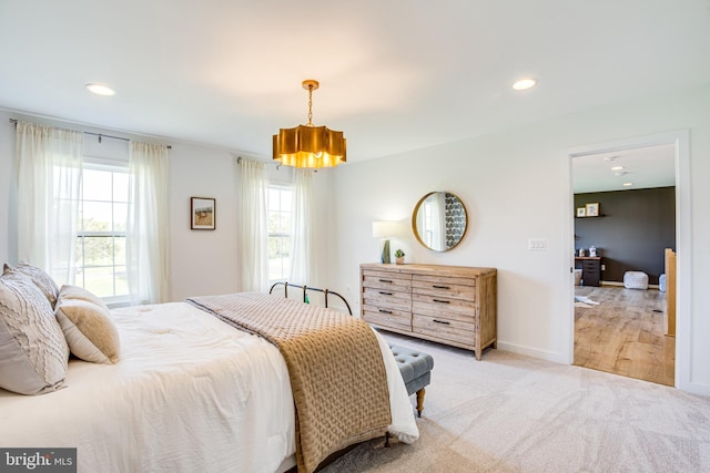 bedroom with light carpet